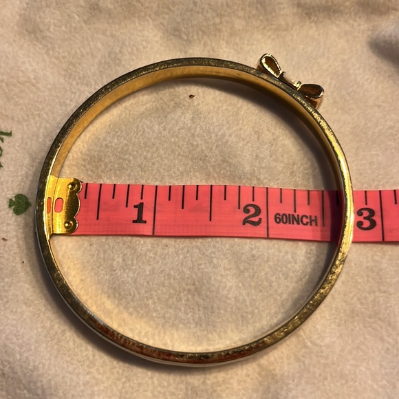 Kate Spade Take a Bow Bangle Bracelet in Cream - Picture 7 of 9